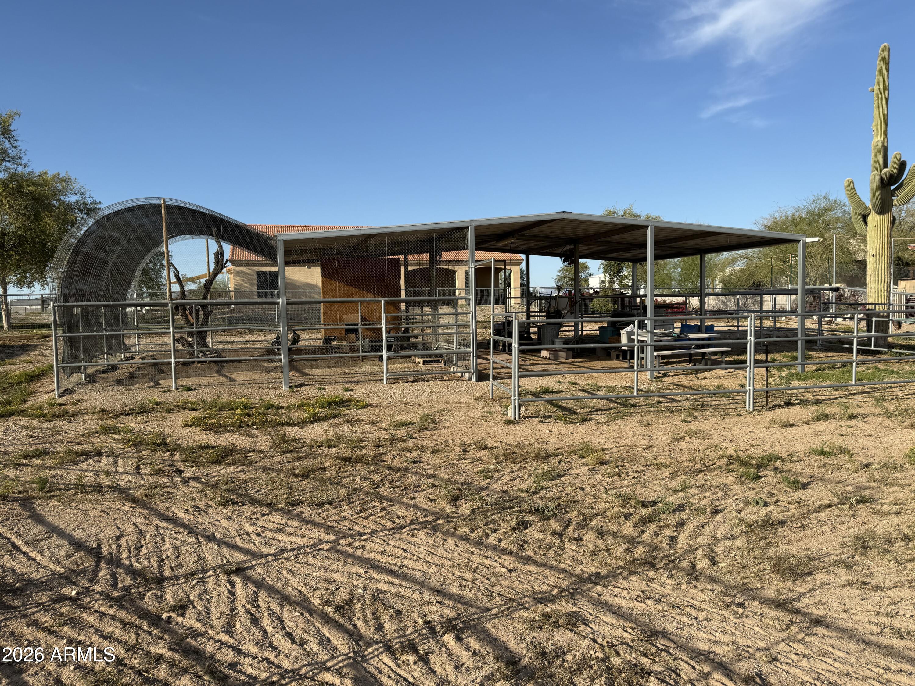 2569 West Silverdale Road San Tan Valley, AZ 85144 - Photo 52 of 61 a backyard of a house with barbeque oven
