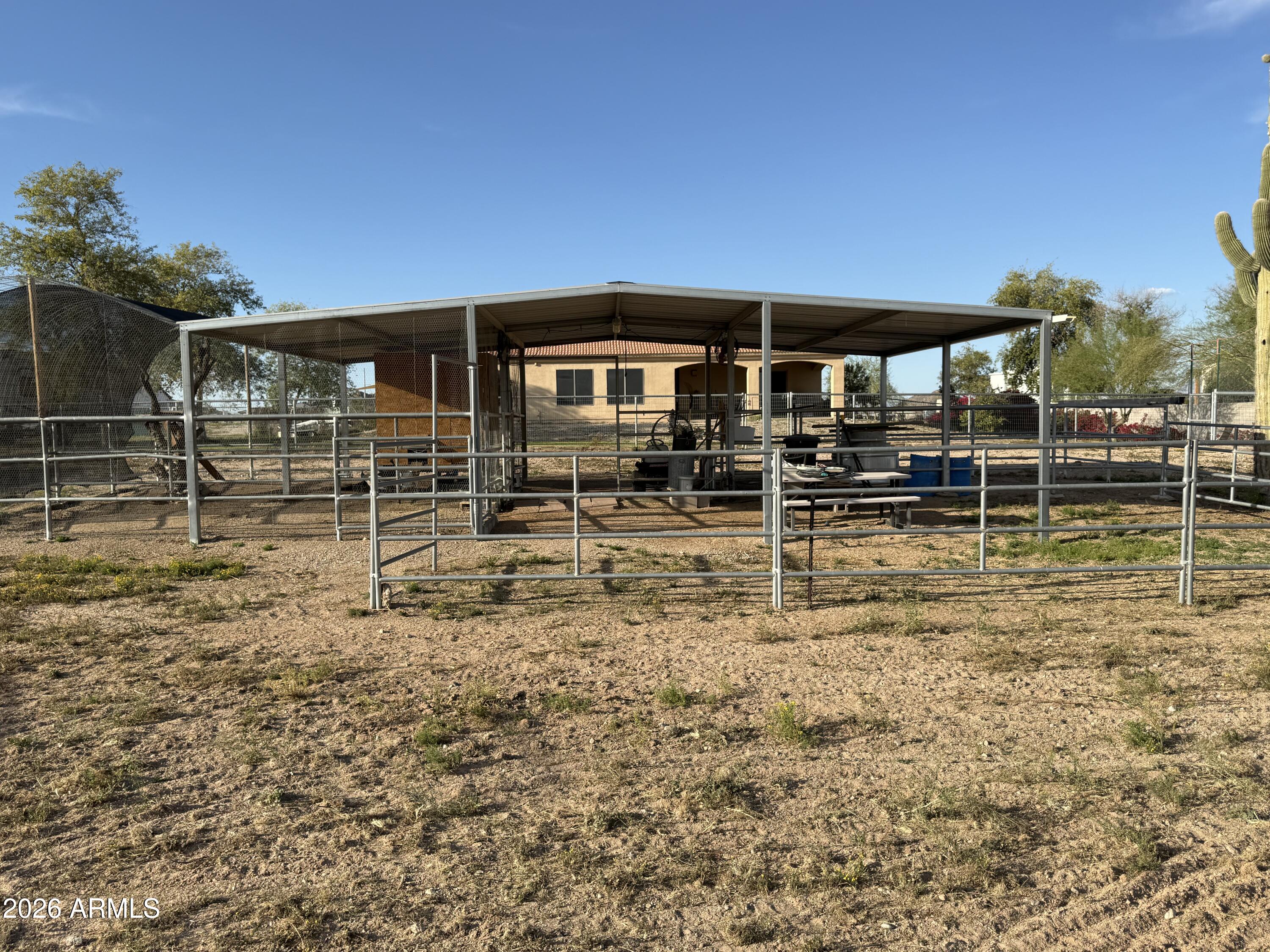 2569 West Silverdale Road San Tan Valley, AZ 85144 - Photo 53 of 61 a backyard of a house with lots of green space