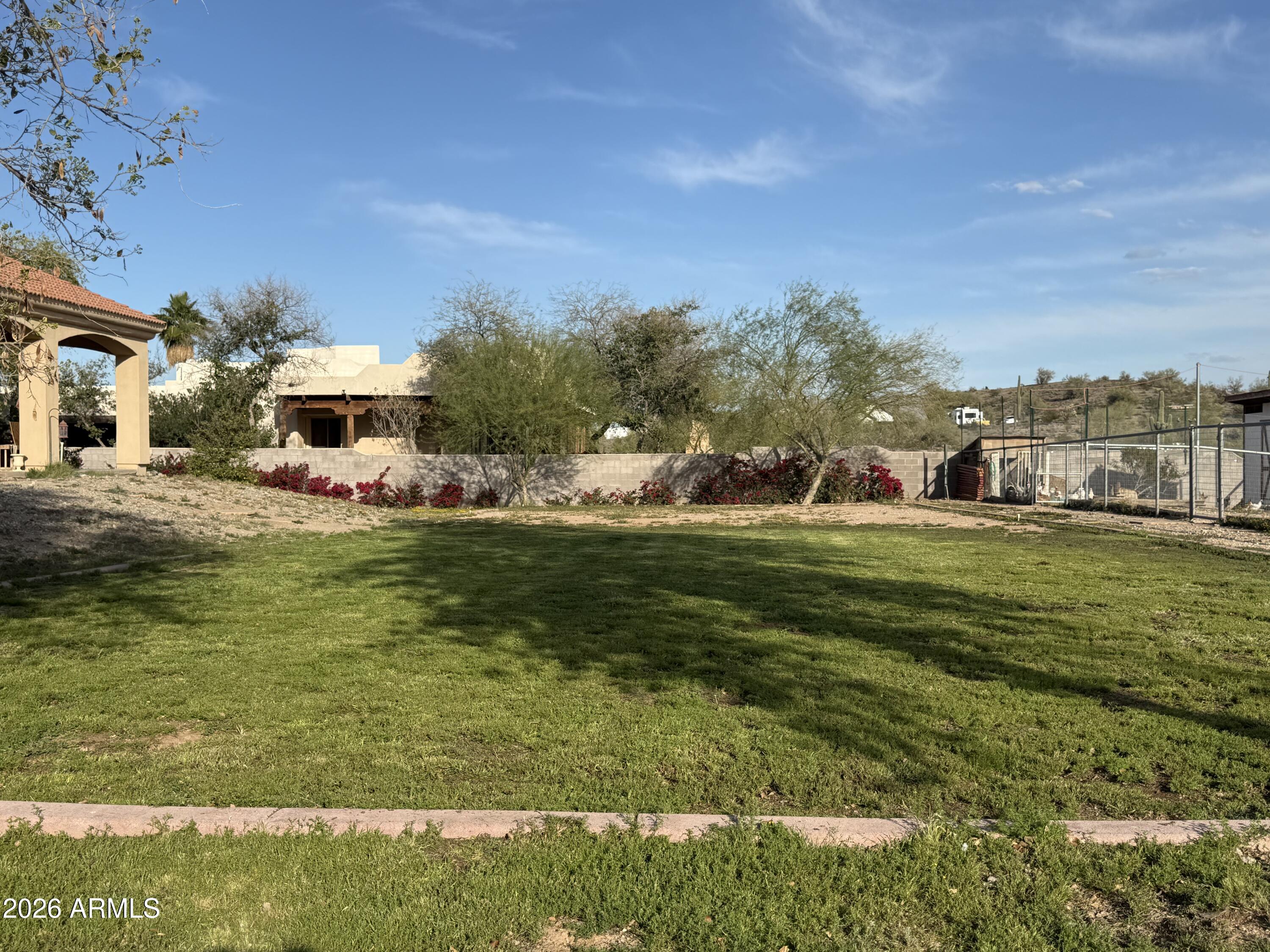 2569 West Silverdale Road San Tan Valley, AZ 85144 - Photo 59 of 61 a view of a town with big yard