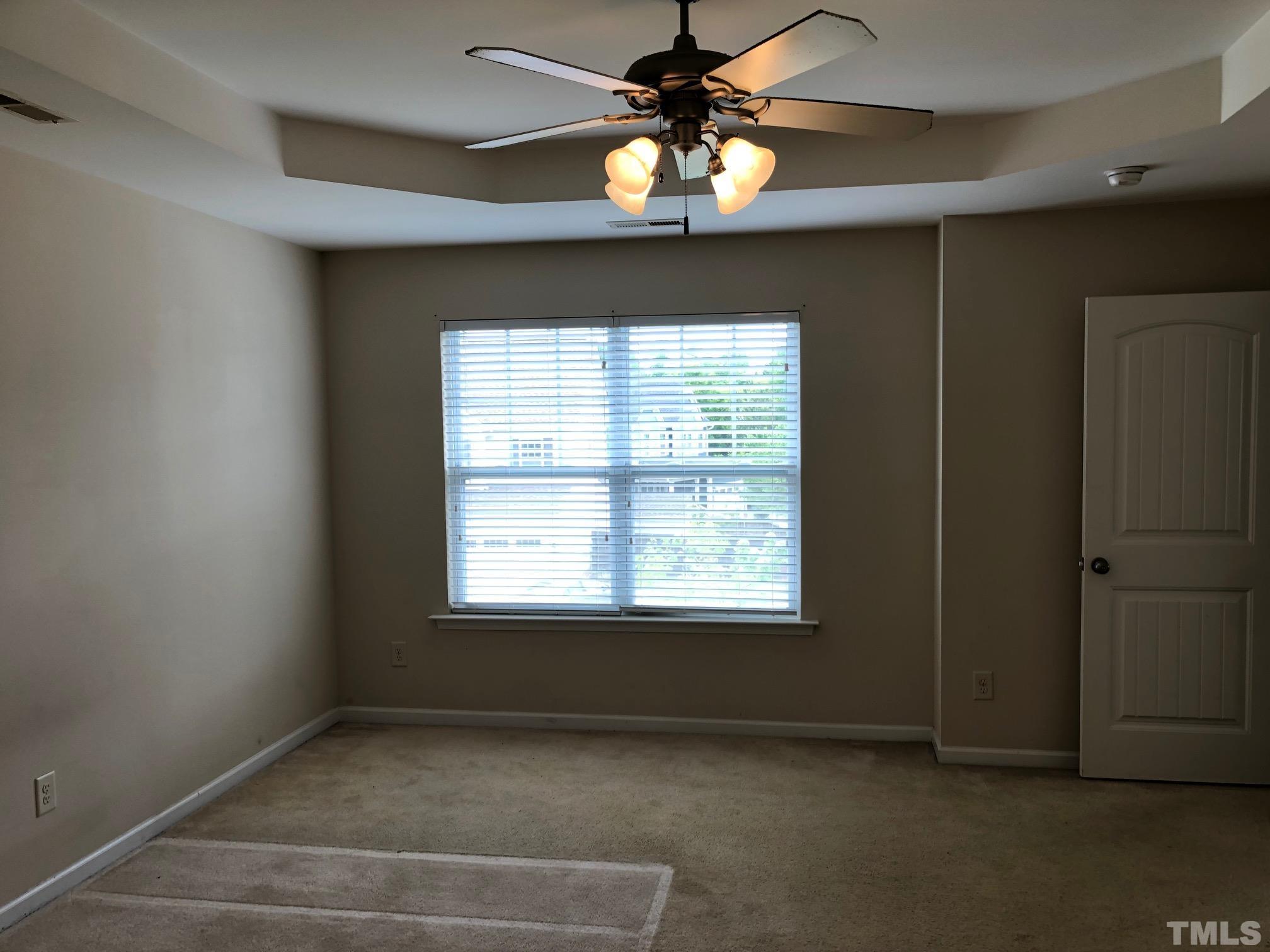 4252 Brintons Cottage Street Raleigh, NC 27616 - Photo 11 of 19 a view of an empty room with a window
