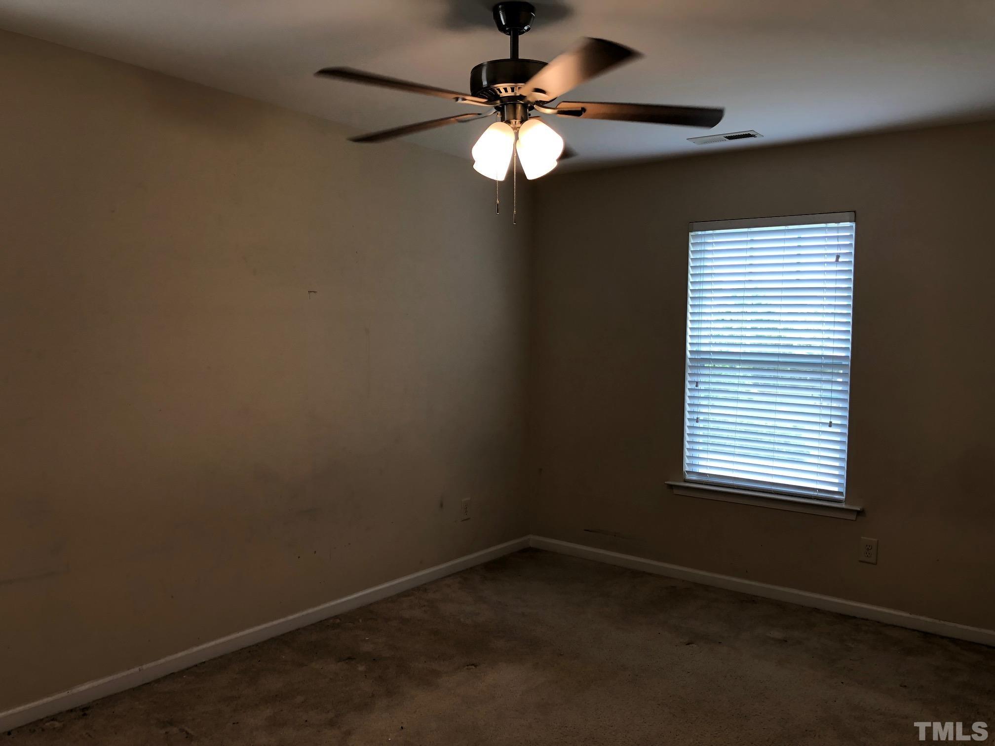 4252 Brintons Cottage Street Raleigh, NC 27616 - Photo 15 of 19 an empty room with a window