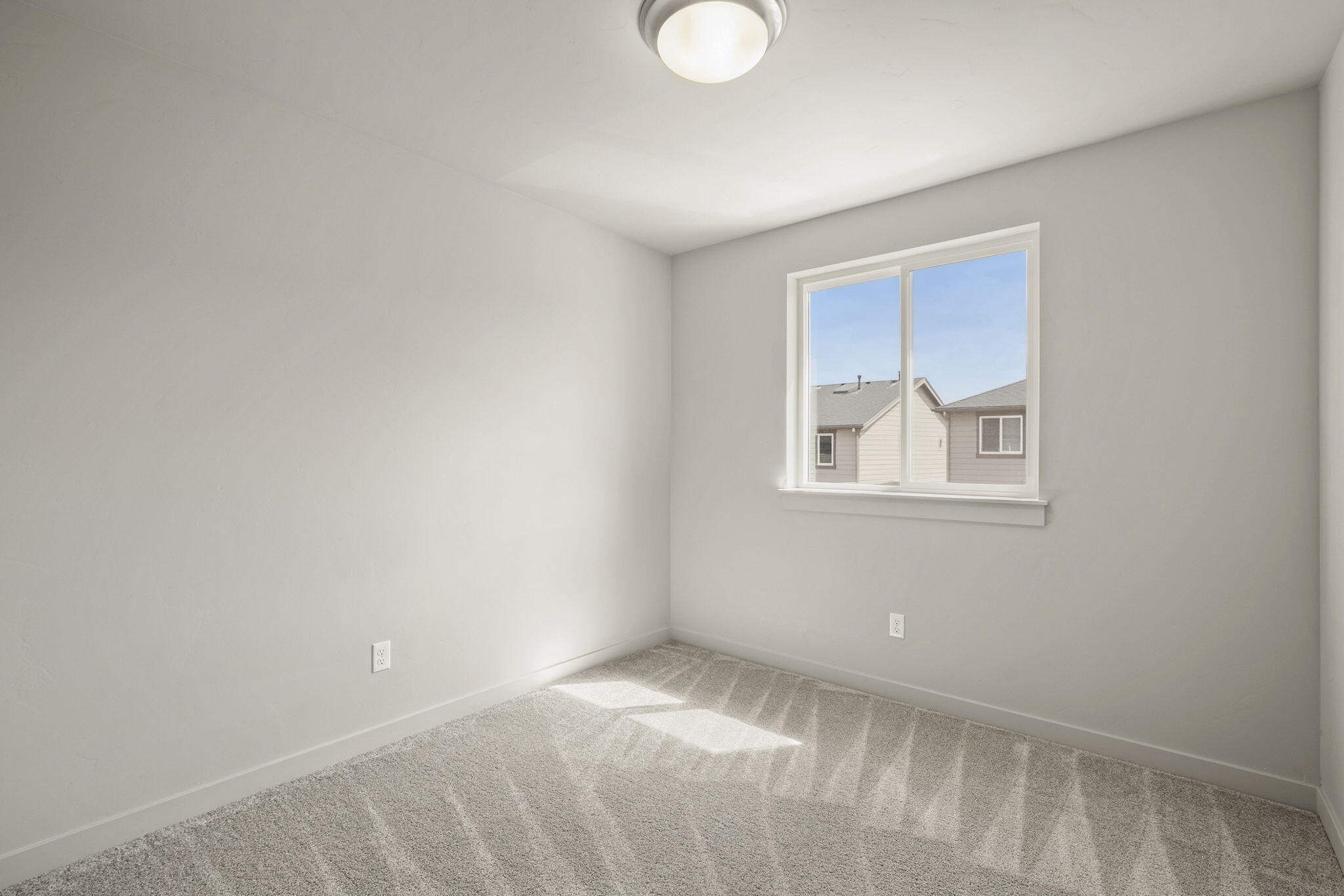 2366 Northeast Victor Place Bend, OR 97701 - Photo 21 of 31 a view of an empty room with a window