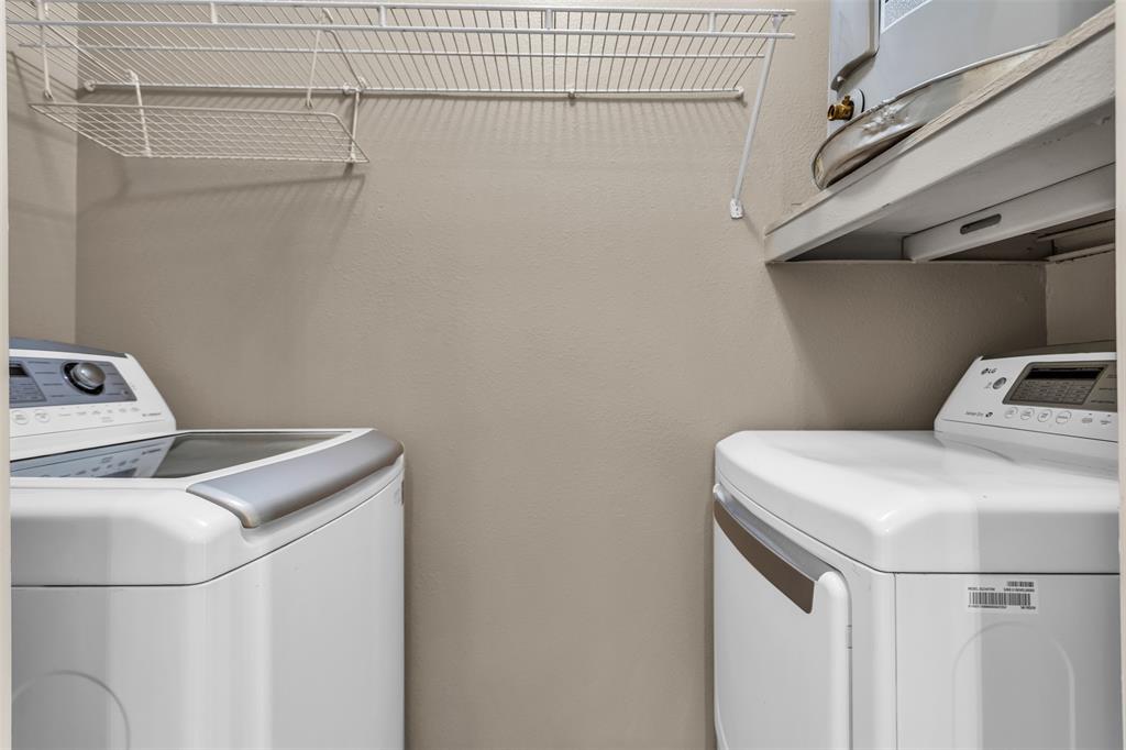 3225 Turtle Creek Boulevard, Unit 10 Dallas, TX 75219 - Photo 9 of 38 Laundry room featuring washer and clothes dryer