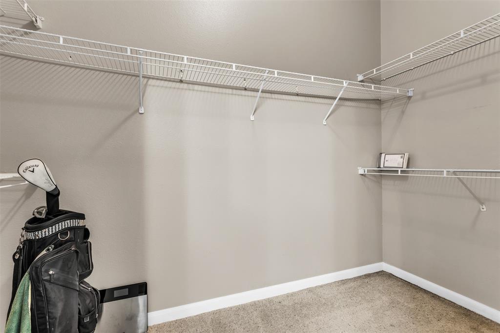 3225 Turtle Creek Boulevard, Unit 10 Dallas, TX 75219 - Photo 13 of 38 Spacious closet with light carpet
