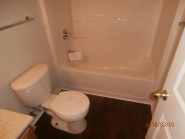 43 Beacon Way Santa Rosa Beach, FL 32459 - Photo 15 of 19 a white toilet sitting next to a bath tub