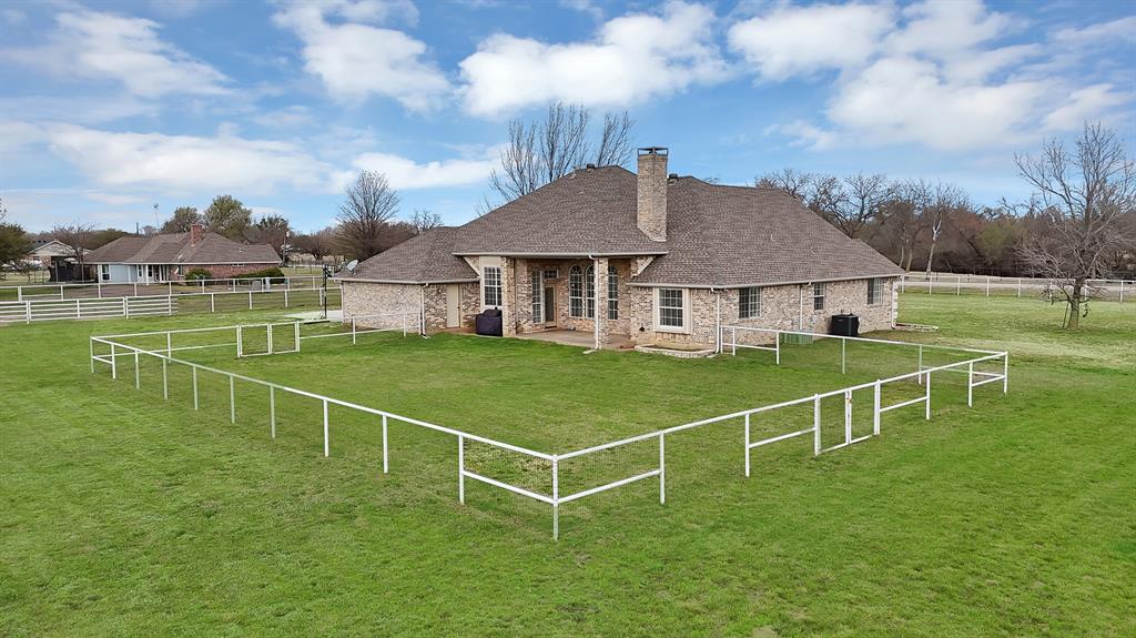11692 Foutch Road Pilot Point, TX 76258 - Photo 37 of 40 a view of a house with a big yard