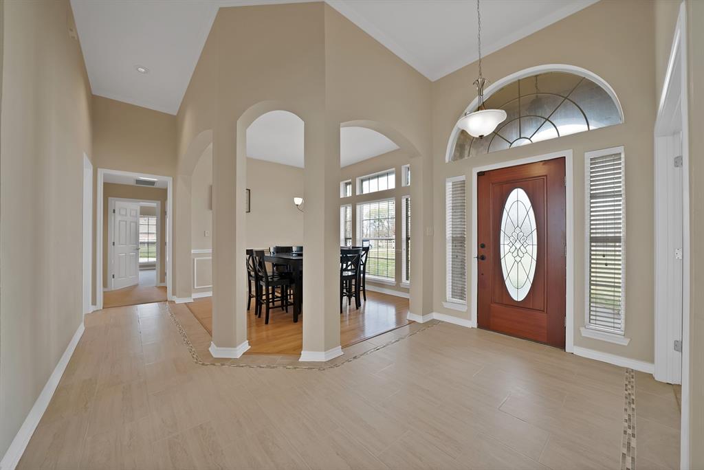 11692 Foutch Road Pilot Point, TX 76258 - Photo 4 of 40 a view of a room with furniture and chandelier