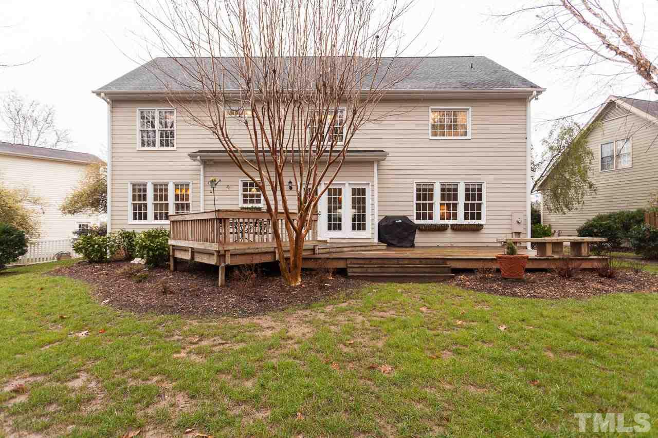 5404 Killarney Hope Drive Raleigh, NC 27613 - Photo 18 of 22 a view of a house with a yard and sitting area