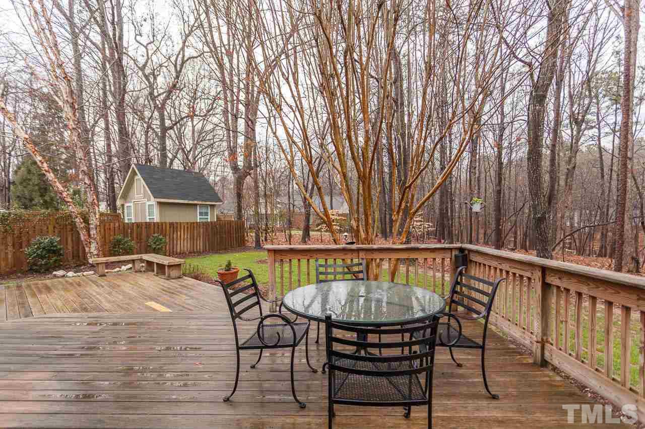 5404 Killarney Hope Drive Raleigh, NC 27613 - Photo 19 of 22 a view of balcony with wooden floor and outdoor seating