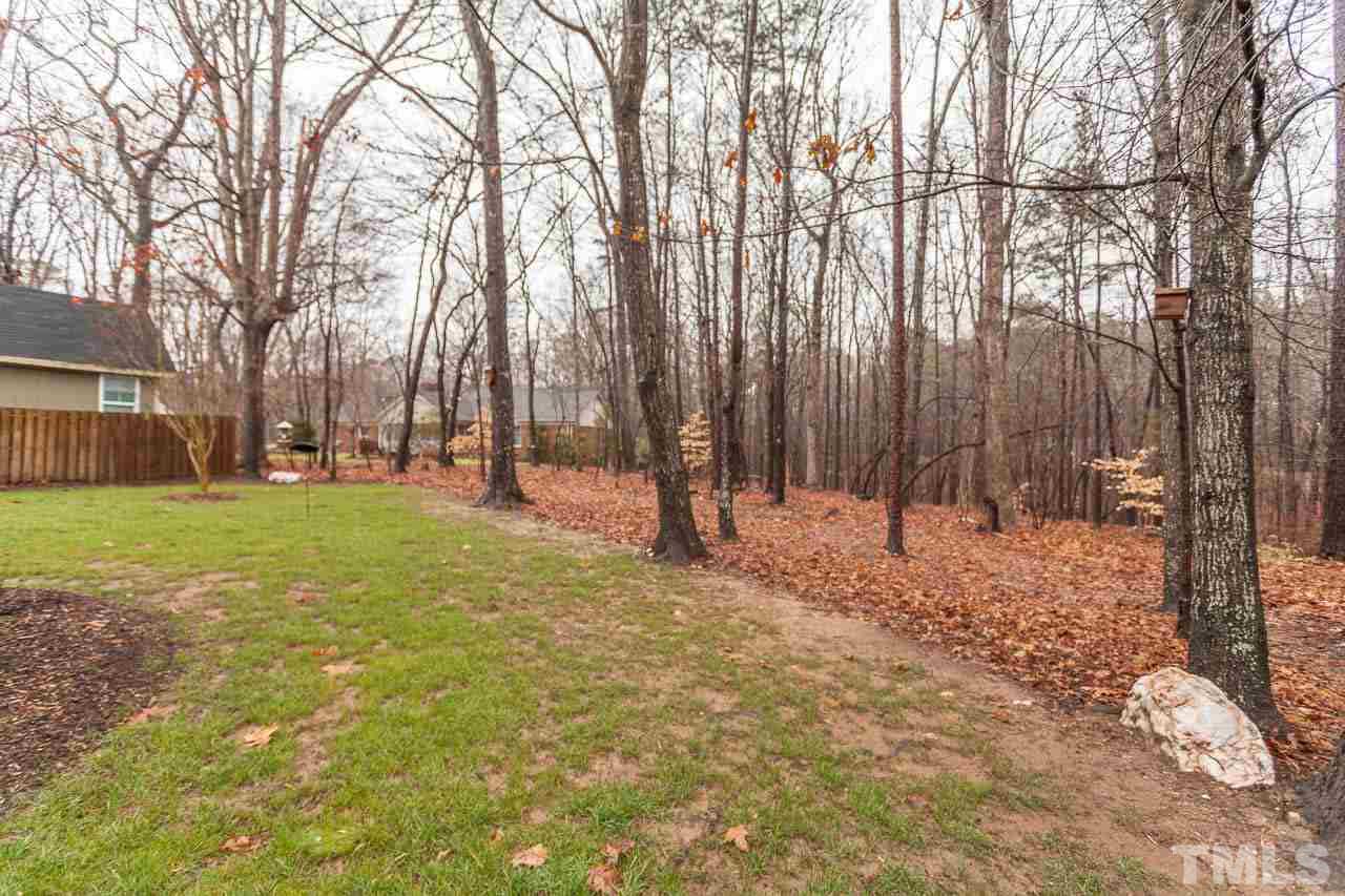 5404 Killarney Hope Drive Raleigh, NC 27613 - Photo 21 of 22 a view of yard with tree