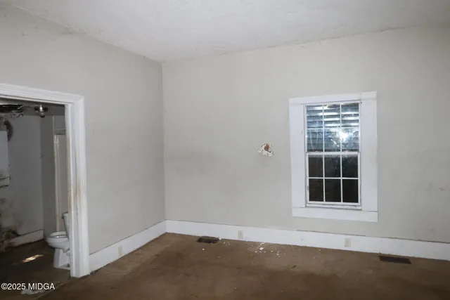 an empty room with a window
