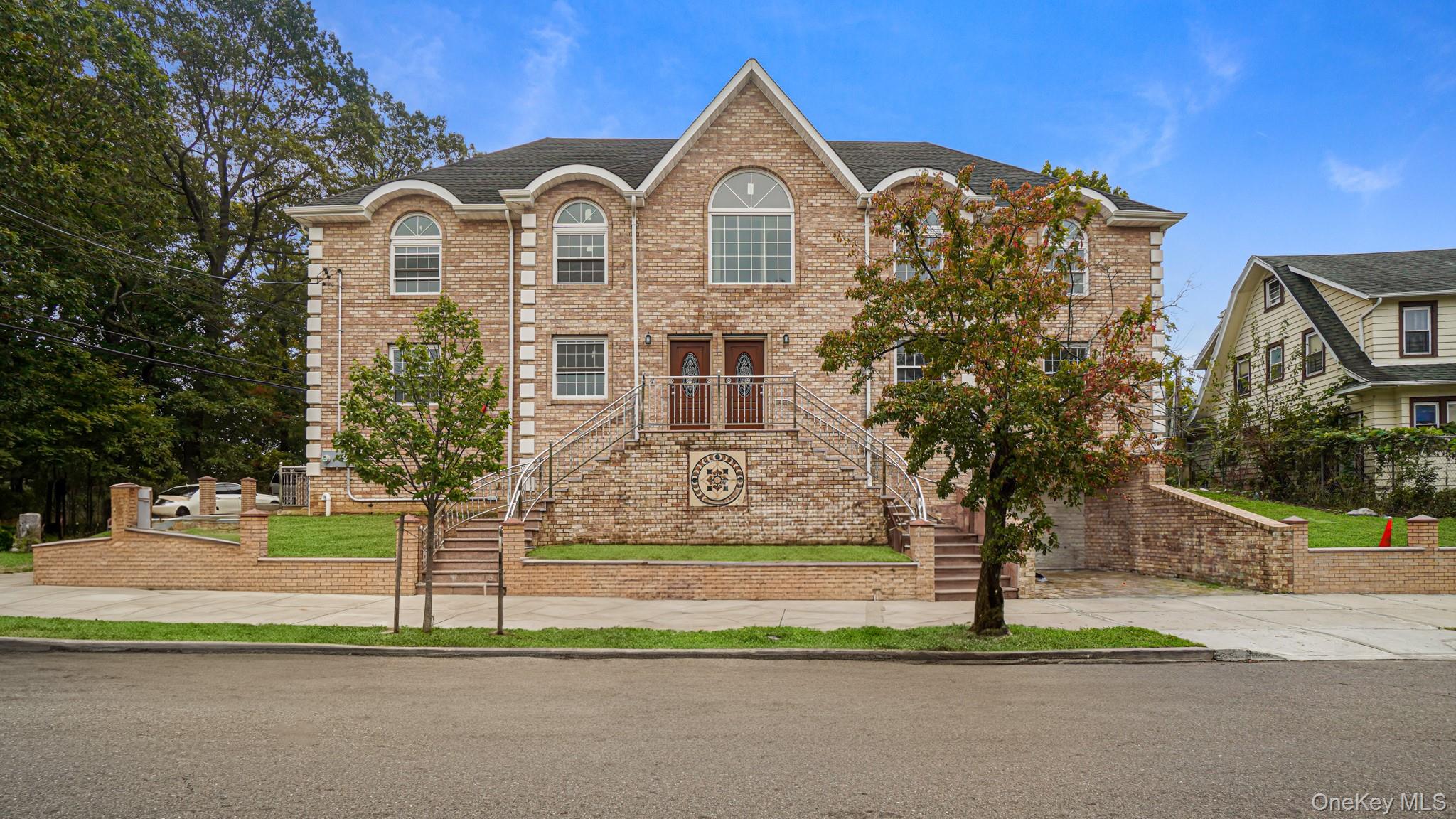 Traditional home with brick siding