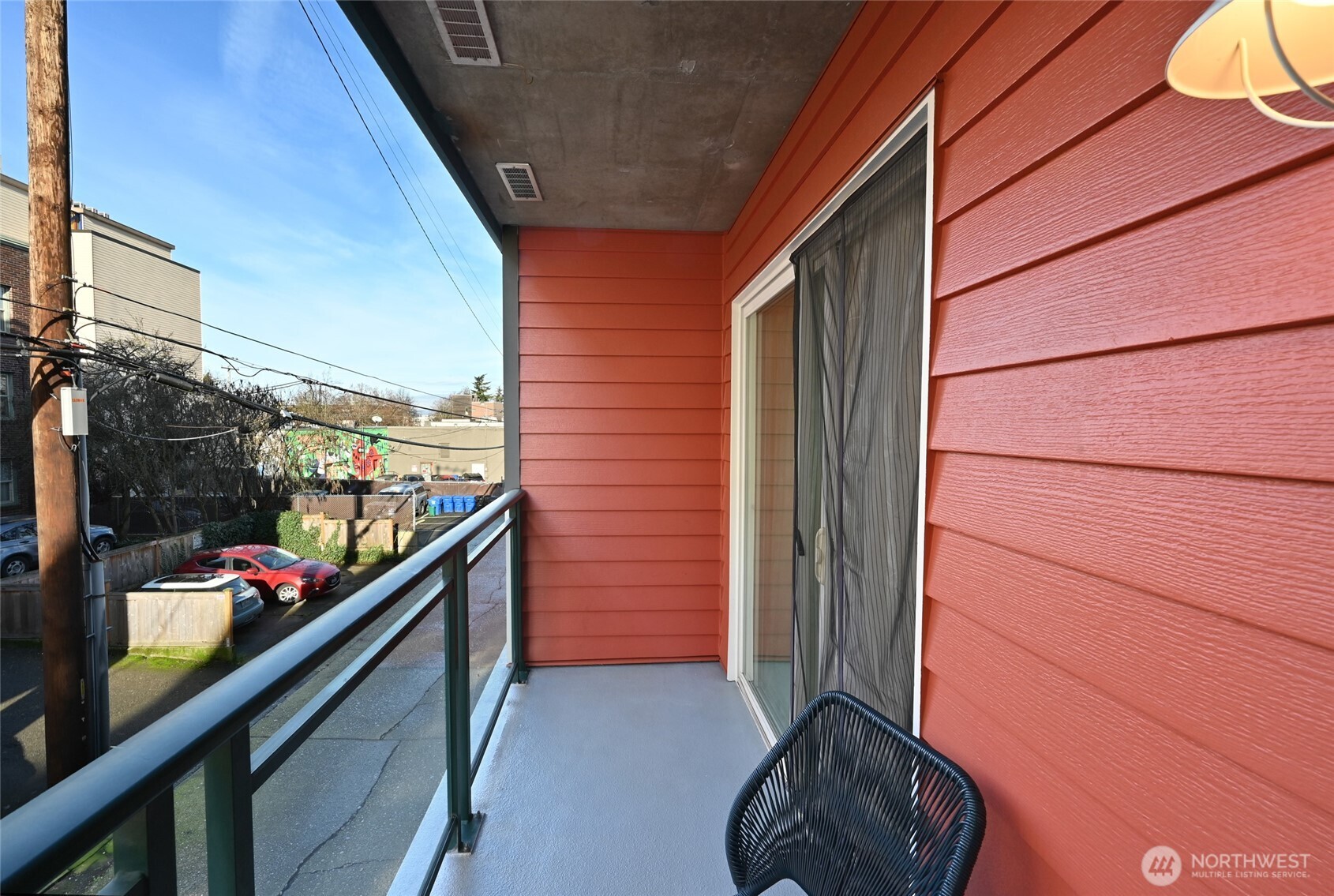 2331 42nd Avenue Southwest, Unit 209 Seattle, WA 98116 - Photo 14 of 21 a balcony with lots of fruit and flowers