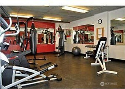 2331 42nd Avenue Southwest, Unit 209 Seattle, WA 98116 - Photo 16 of 21 a view of a room with gym equipment