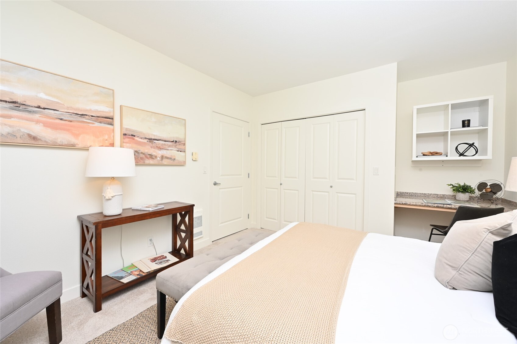 2331 42nd Avenue Southwest, Unit 209 Seattle, WA 98116 - Photo 10 of 21 a bedroom with a bed and a potted plant