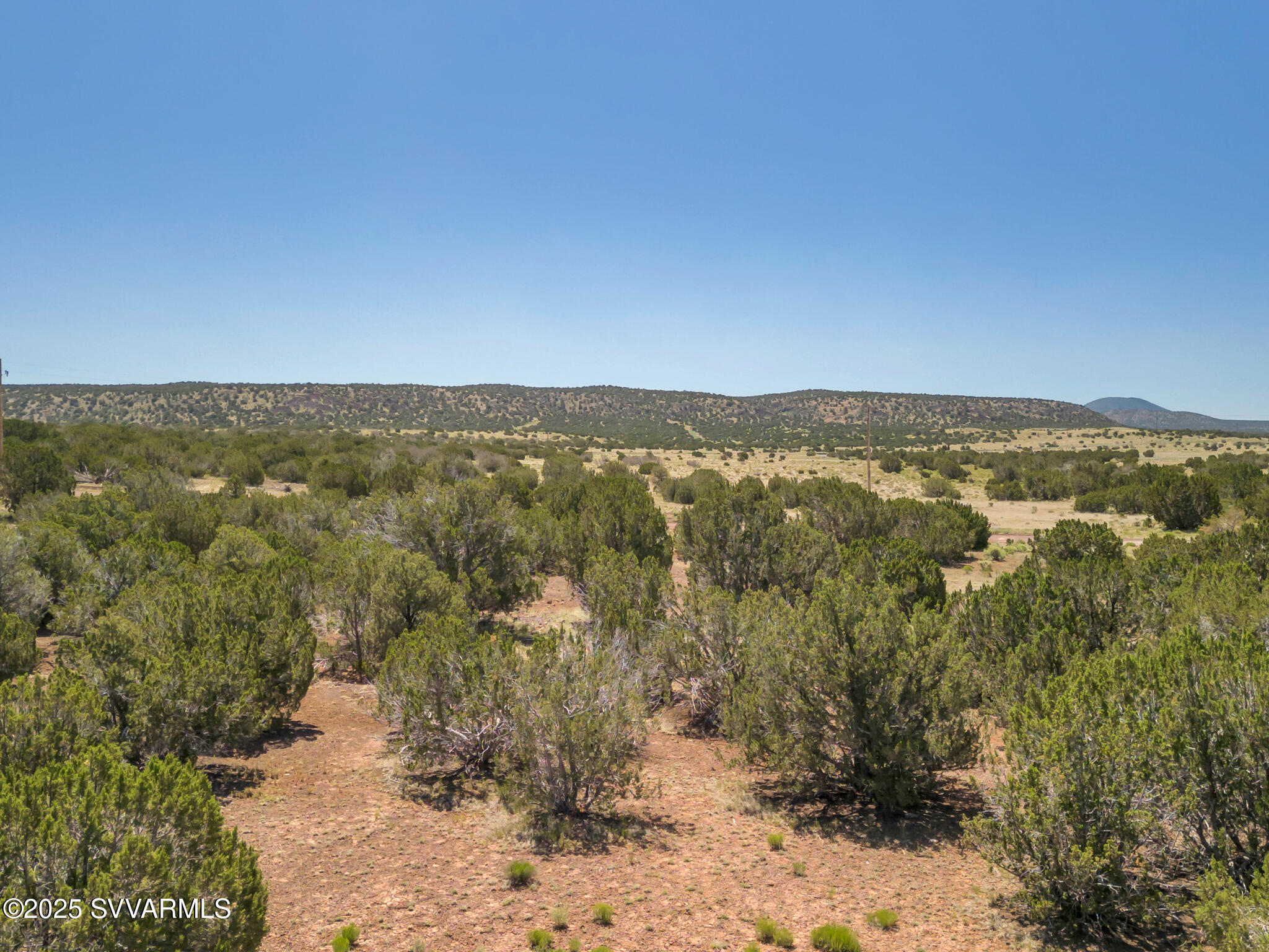 2179 West Critter Pass Road Williams, AZ 86046 - Photo 17 of 34 an aerial view of residential houses with outdoor space