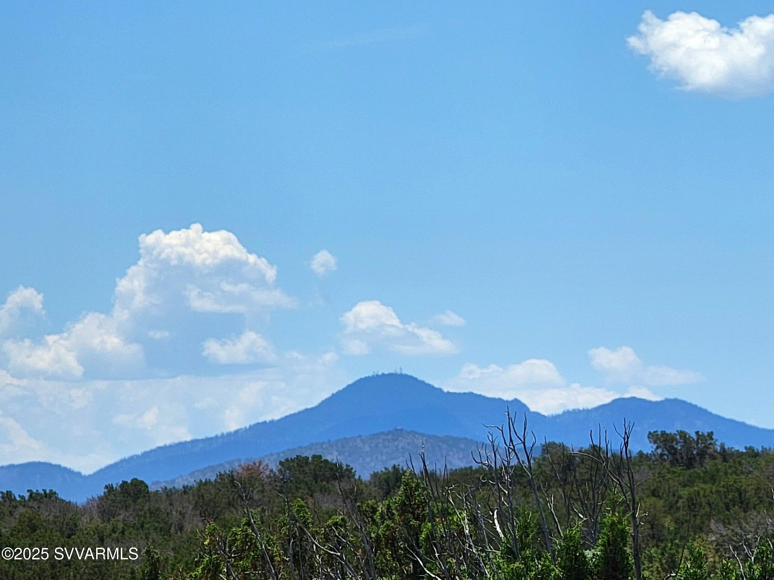 2179 West Critter Pass Road Williams, AZ 86046 - Photo 34 of 34 a view of a lake in middle of forest