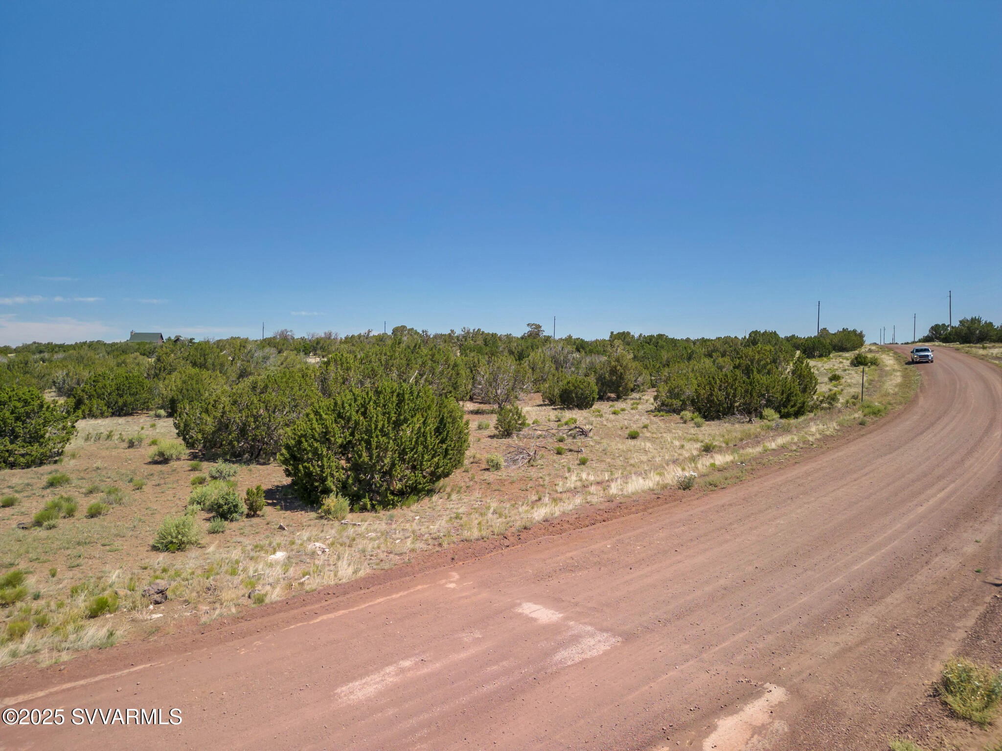 2179 West Critter Pass Road Williams, AZ 86046 - Photo 9 of 34 a view of a road with a yard
