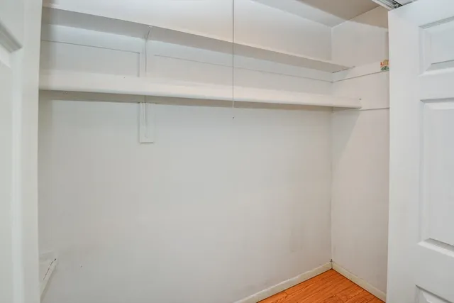 a view of a room with racks on the wall