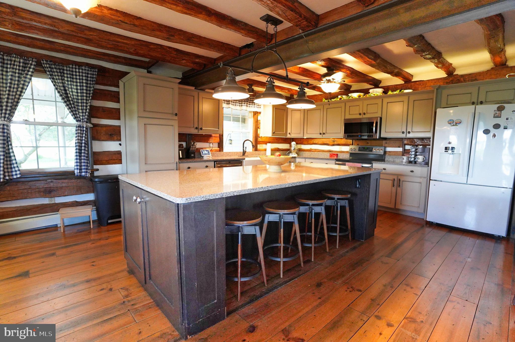 2215 Centennial Road Hanover, PA 17331 - Photo 16 of 60 a kitchen with lots of counter top space and stainless steel appliances
