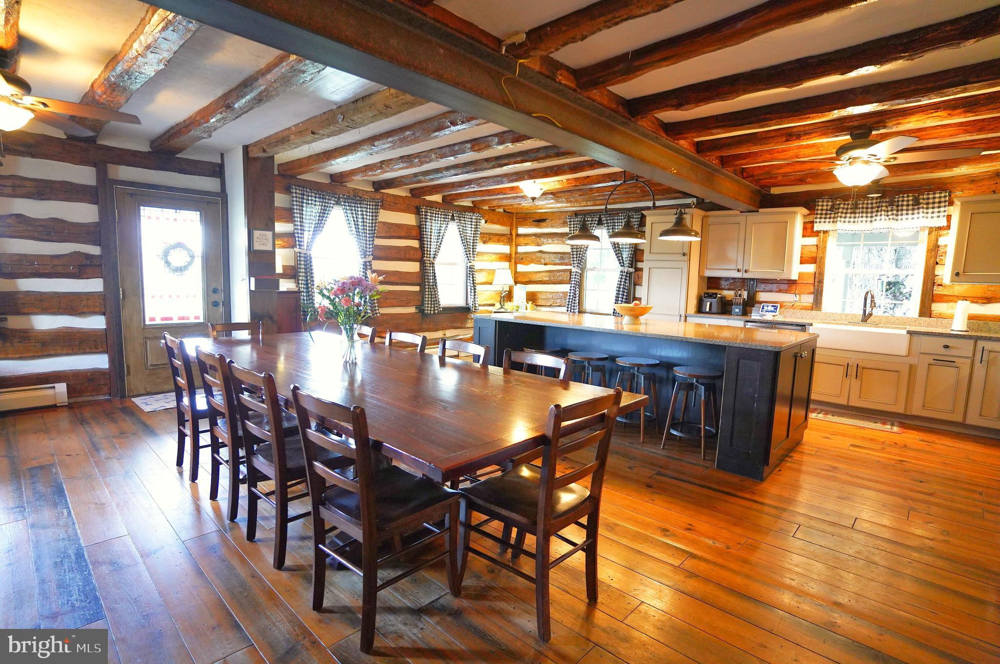 2215 Centennial Road Hanover, PA 17331 - Photo 17 of 60 a view of a dining room with furniture window and wooden floor