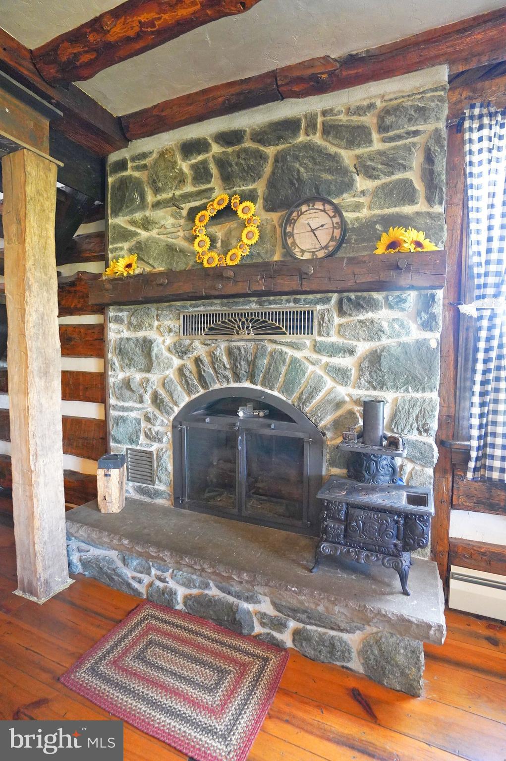 2215 Centennial Road Hanover, PA 17331 - Photo 20 of 60 a room with fireplace and outdoor view