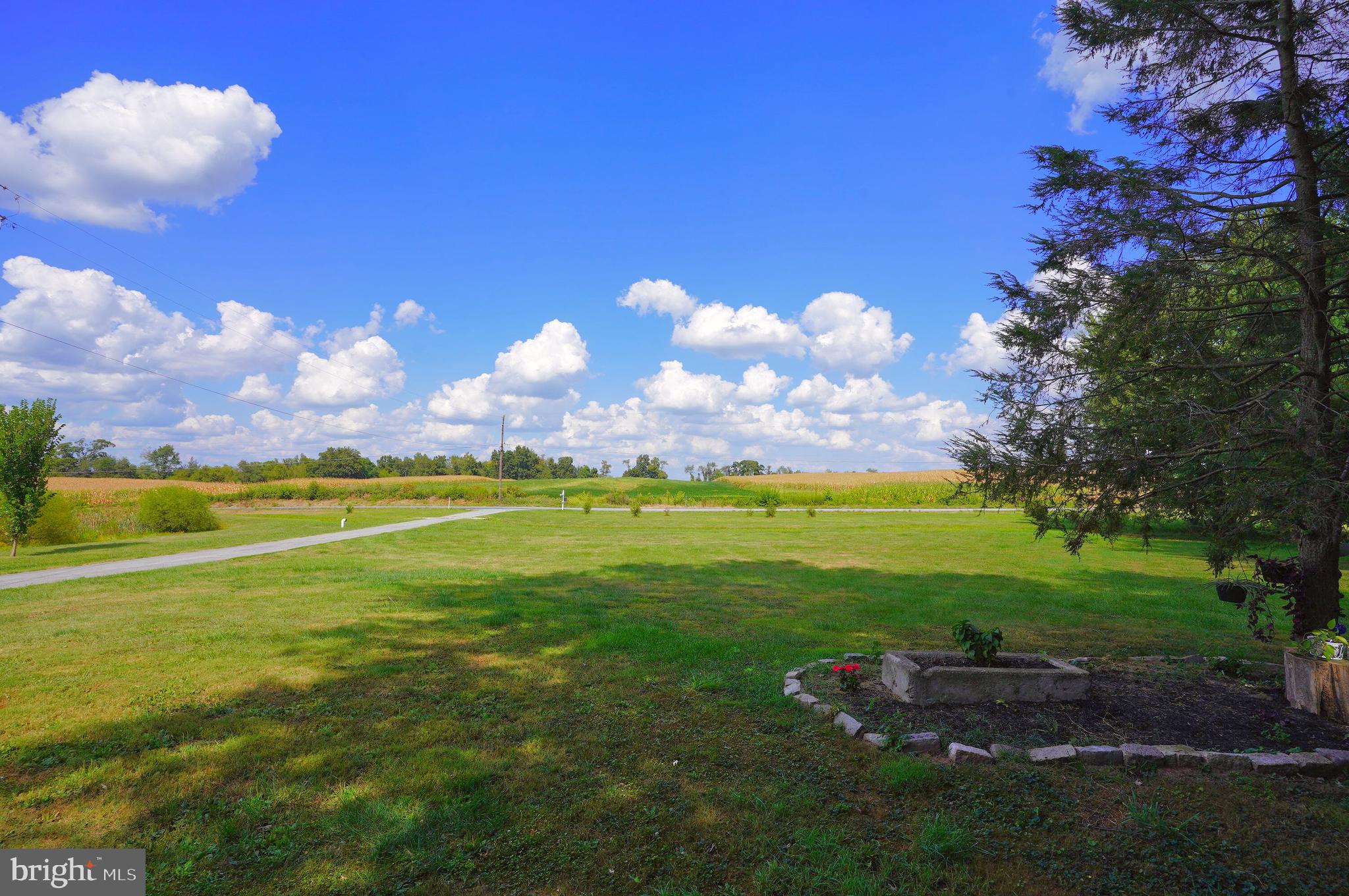 2215 Centennial Road Hanover, PA 17331 - Photo 2 of 60 a view of a golf course with a lake