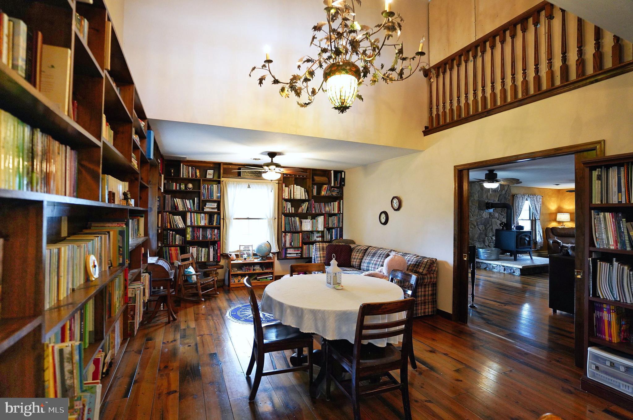 2215 Centennial Road Hanover, PA 17331 - Photo 26 of 60 a view of a dining room with furniture and wooden floor