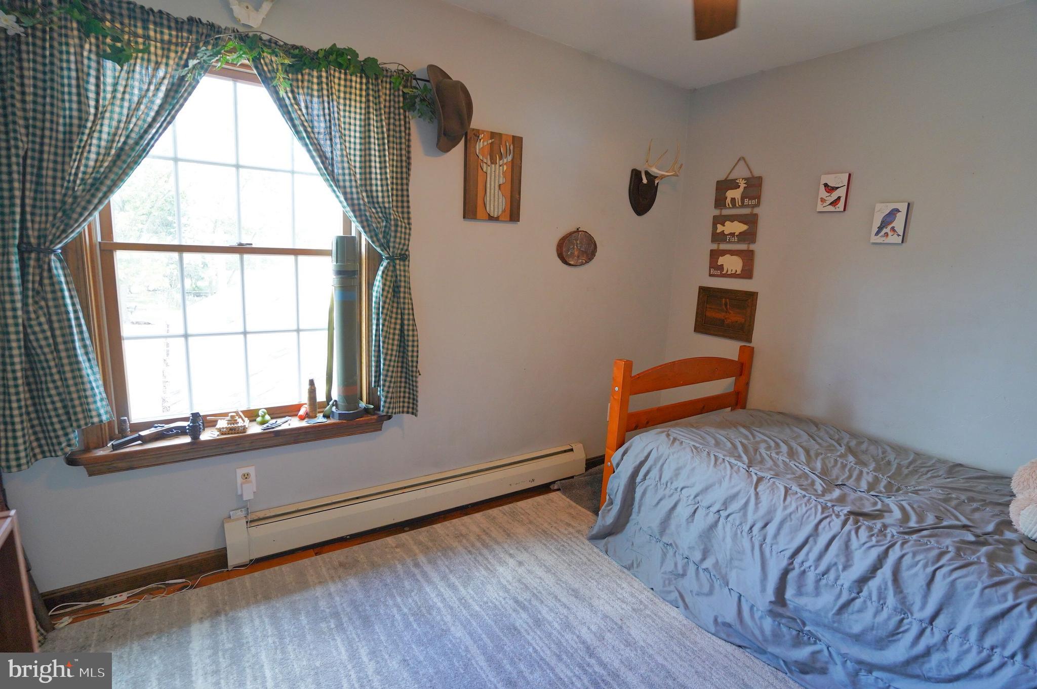 2215 Centennial Road Hanover, PA 17331 - Photo 41 of 60 a bedroom with a bed and a window