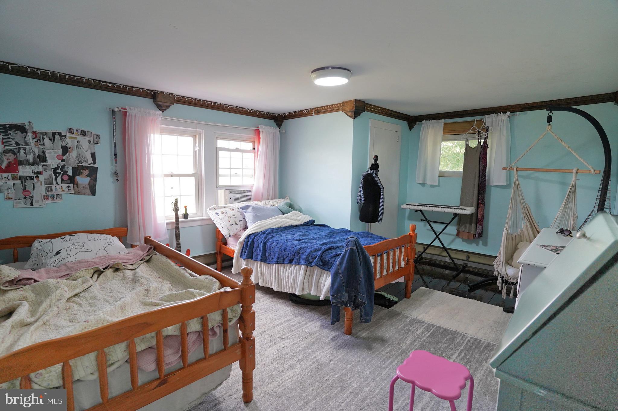 2215 Centennial Road Hanover, PA 17331 - Photo 42 of 60 a bedroom with a bed and wooden floor