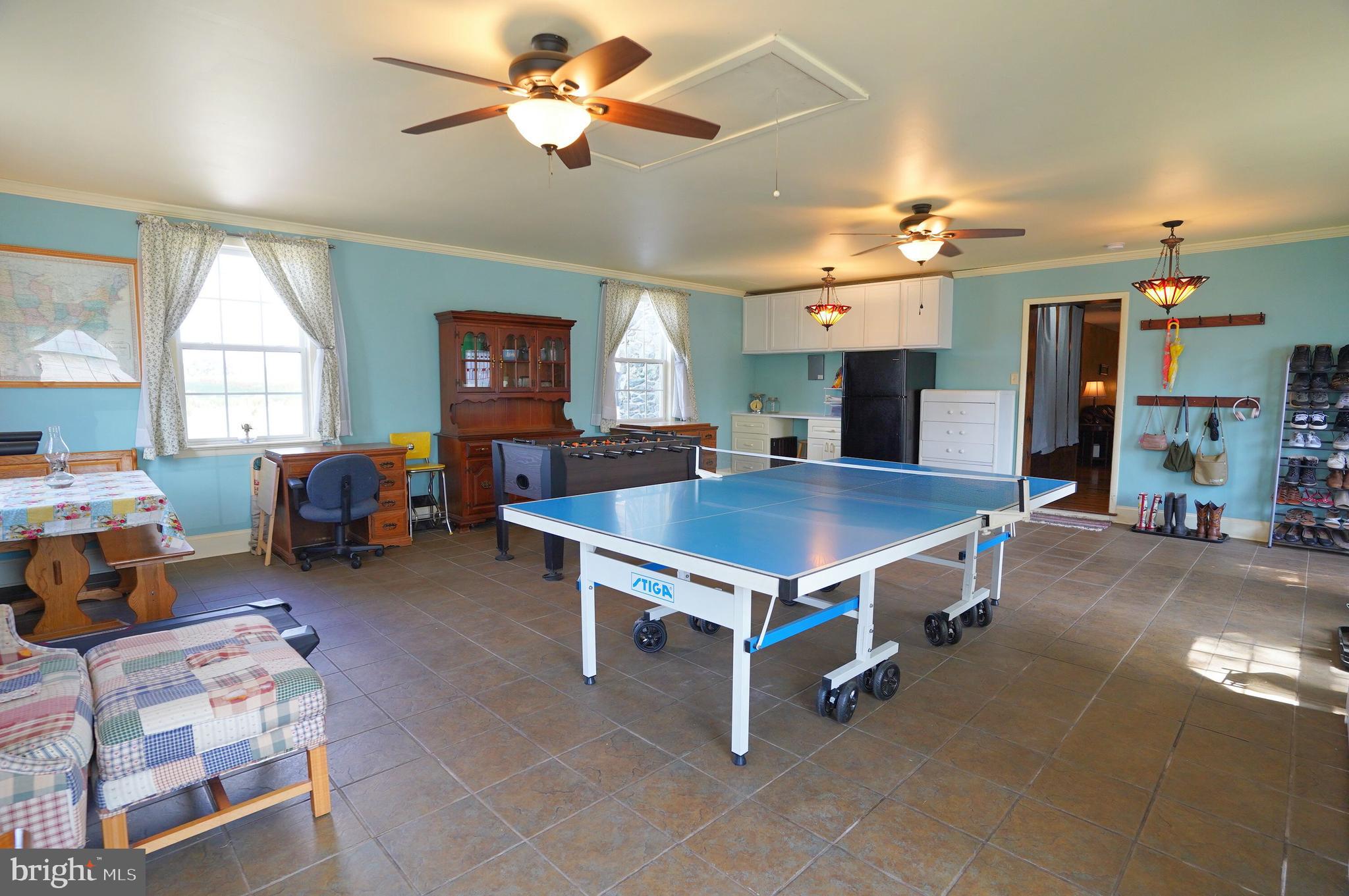 2215 Centennial Road Hanover, PA 17331 - Photo 47 of 60 a living room with furniture a table and kitchen view