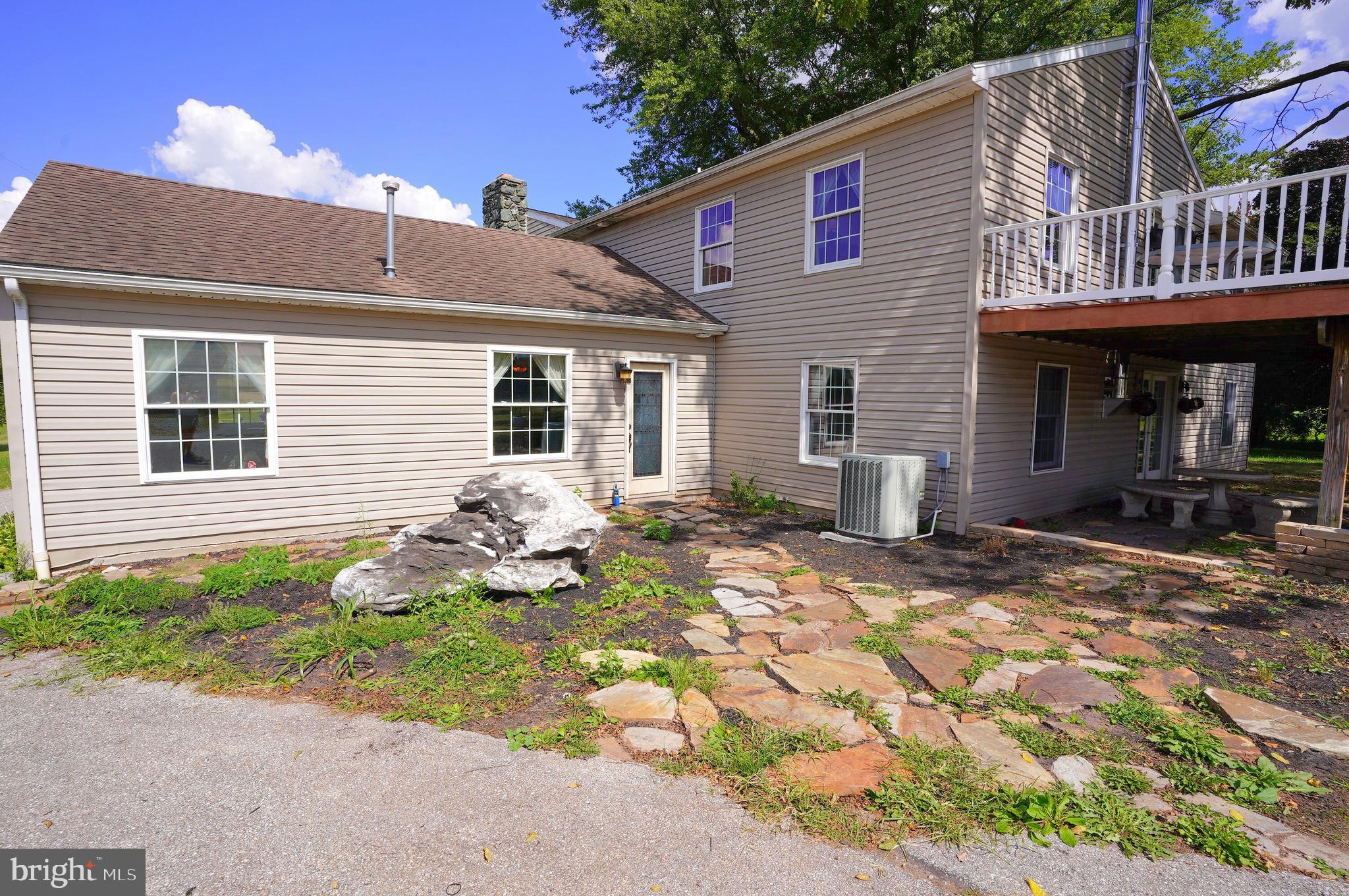 2215 Centennial Road Hanover, PA 17331 - Photo 49 of 60 a front view of a house with garden
