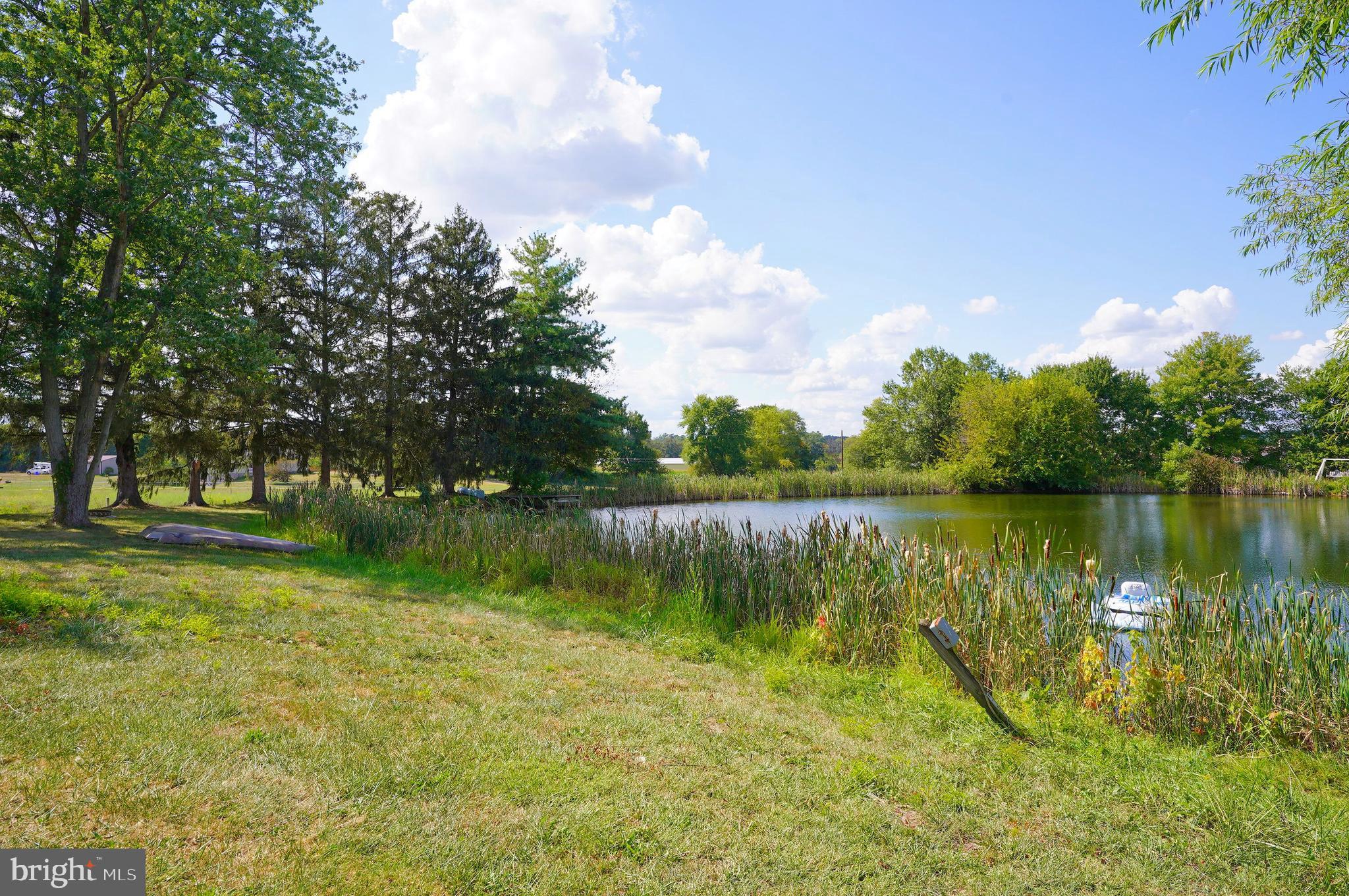 2215 Centennial Road Hanover, PA 17331 - Photo 55 of 60 a view of a lake with a house in the background