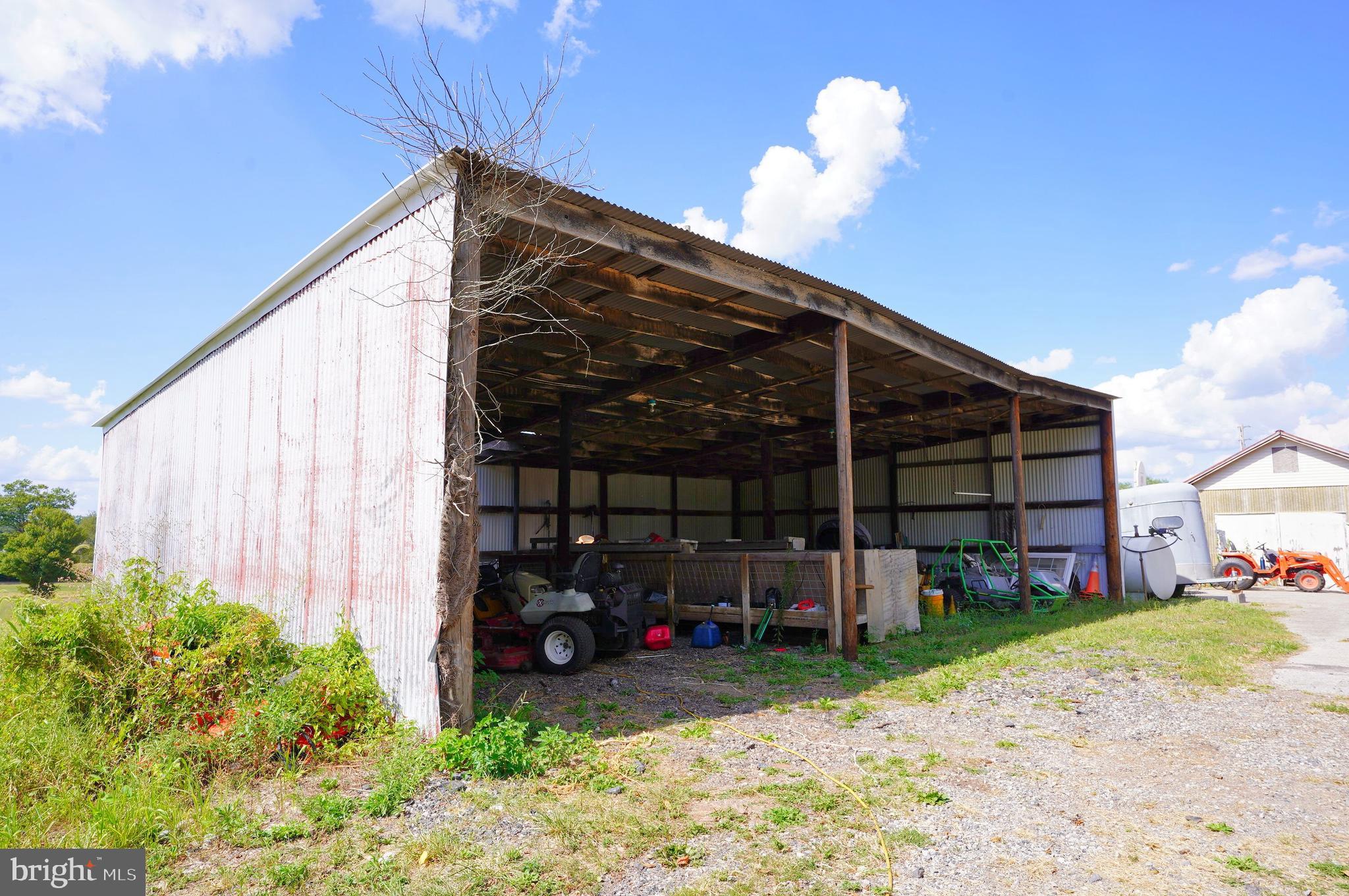 2215 Centennial Road Hanover, PA 17331 - Photo 59 of 60 a view of a chair and table in backyard