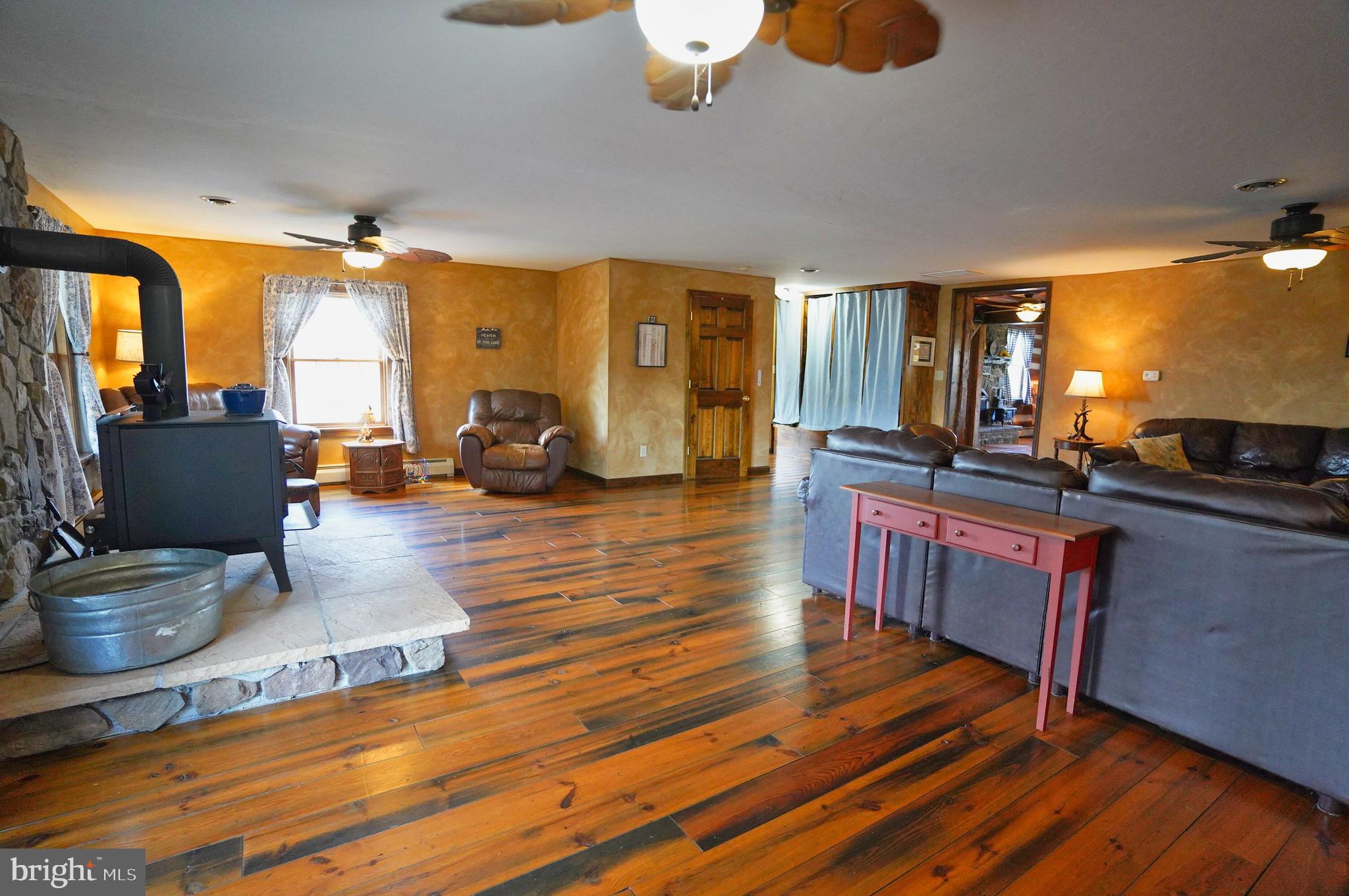 2215 Centennial Road Hanover, PA 17331 - Photo 8 of 60 a living room with furniture and a large window