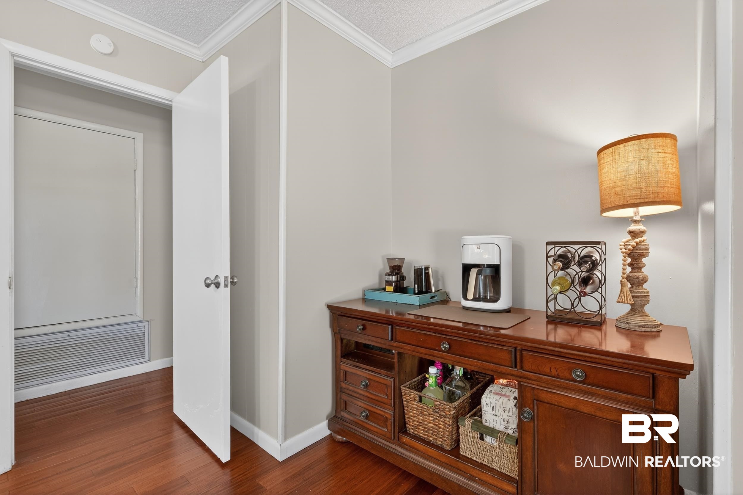 46006 Pecan Lane Bay Minette, AL 36507 - Photo 20 of 40 Corridor with ornamental molding and dark wood-type flooring