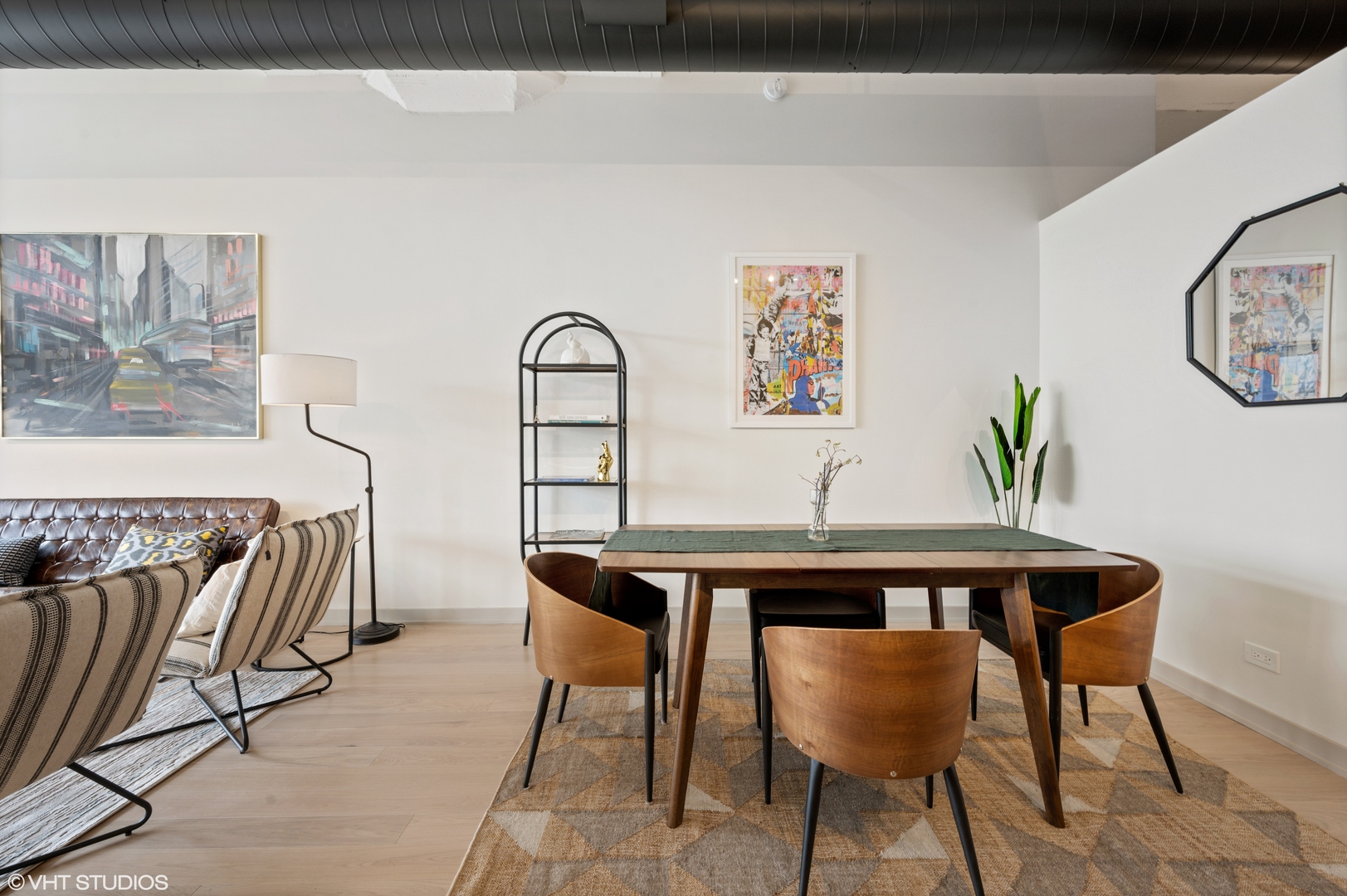 1530 South State Street, Unit 628 Chicago, IL 60605 - Photo 13 of 30 a view of a dining room with furniture and a kitchen