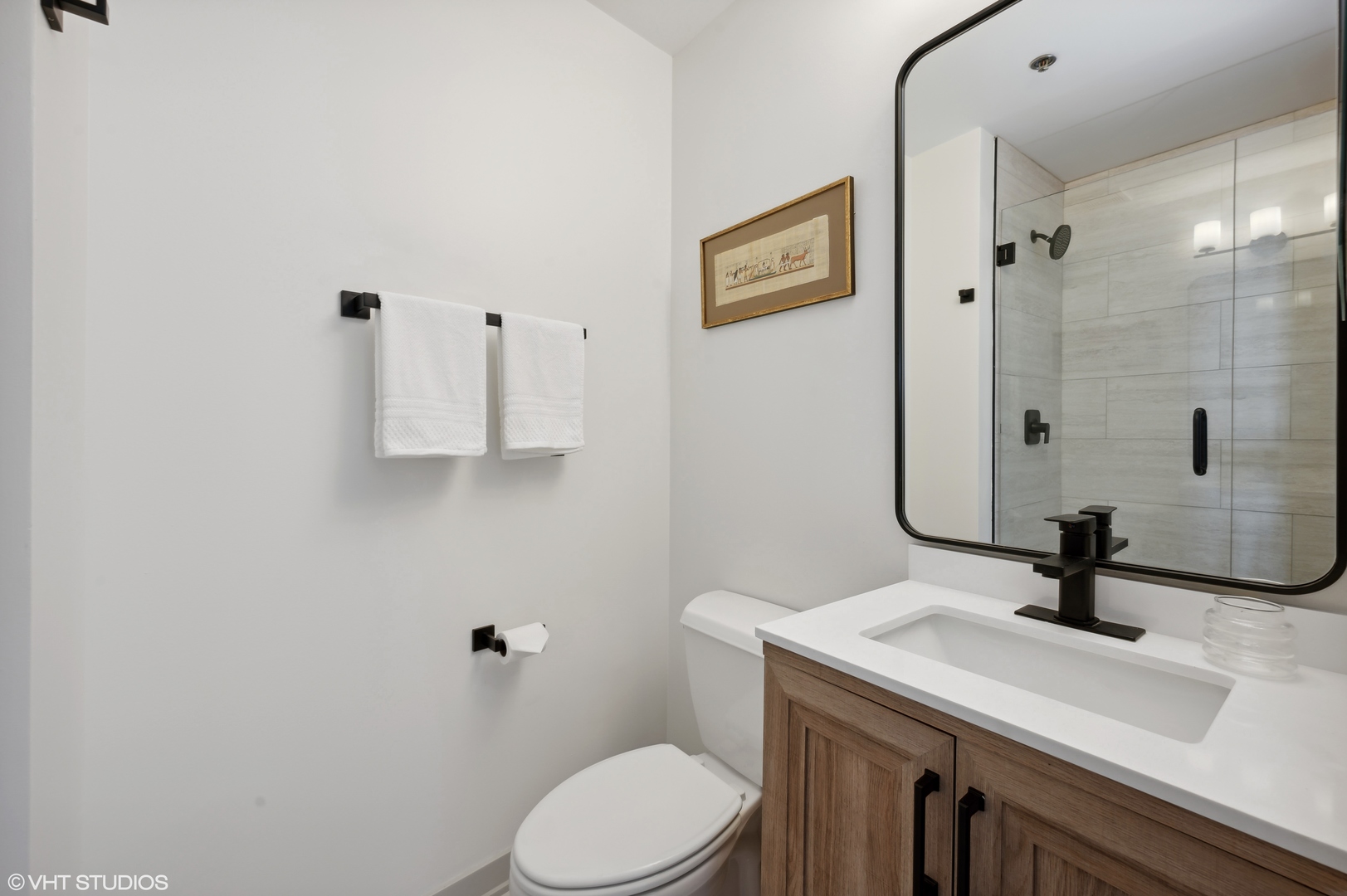 1530 South State Street, Unit 628 Chicago, IL 60605 - Photo 18 of 30 a bathroom with a sink a toilet and shower