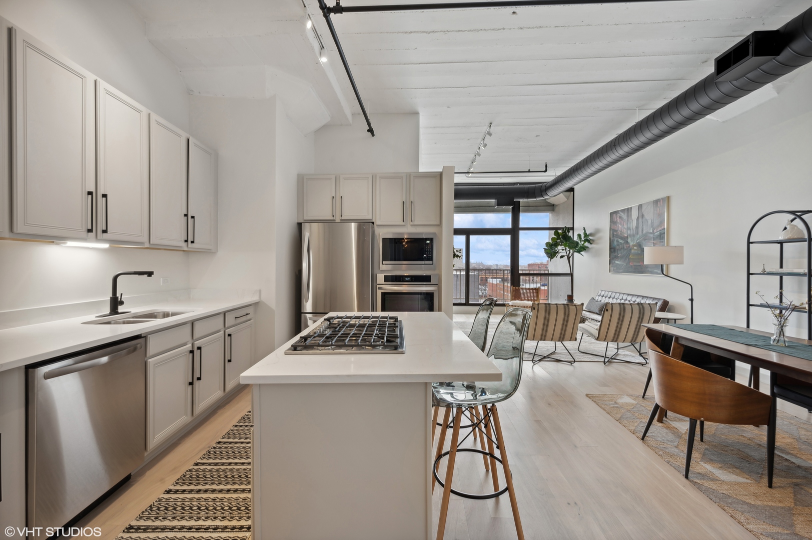 1530 South State Street, Unit 628 Chicago, IL 60605 - Photo 6 of 30 a kitchen with stainless steel appliances a stove a sink dishwasher and a refrigerator