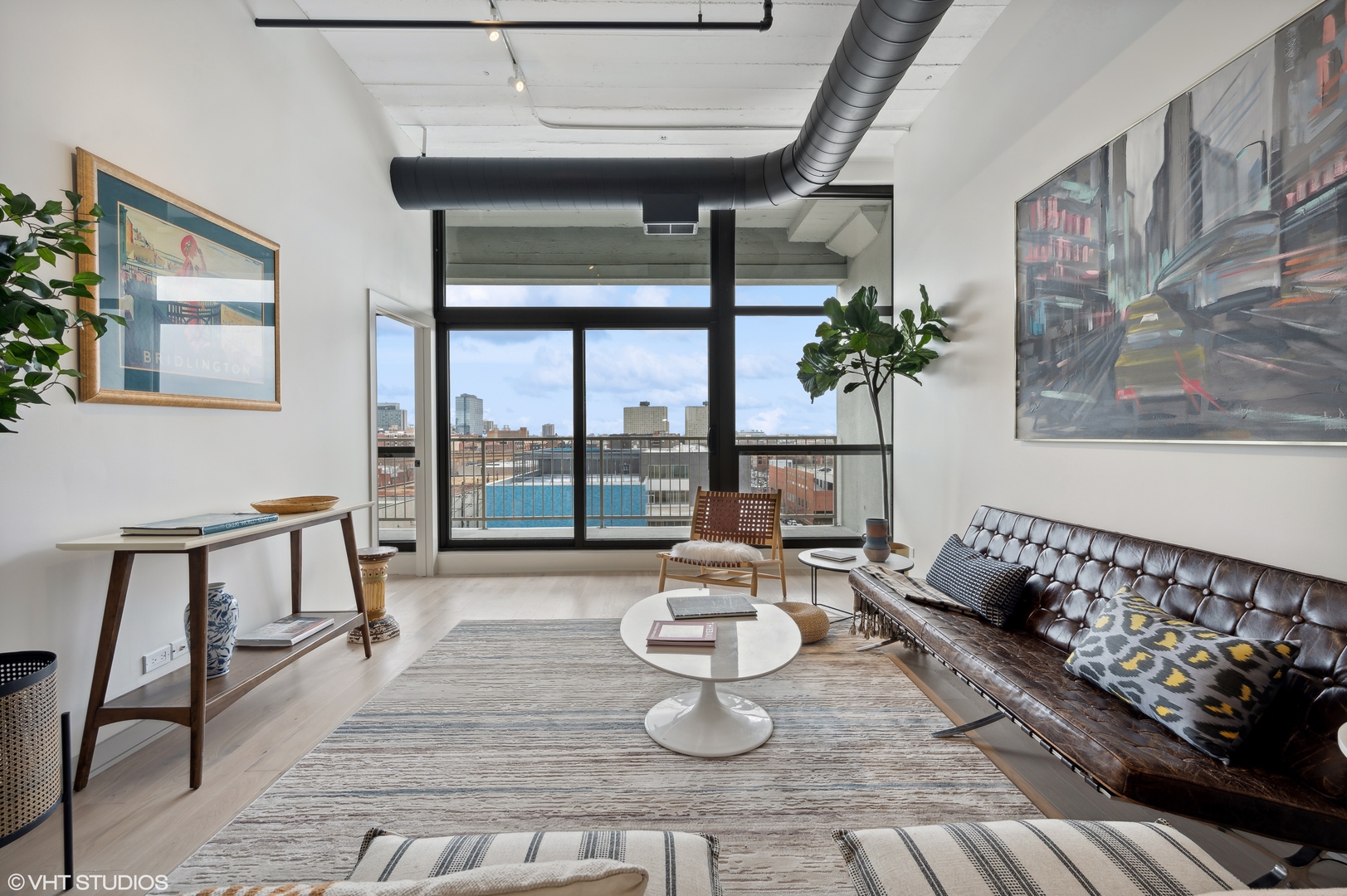 1530 South State Street, Unit 628 Chicago, IL 60605 - Photo 9 of 30 a living room with furniture and a large window
