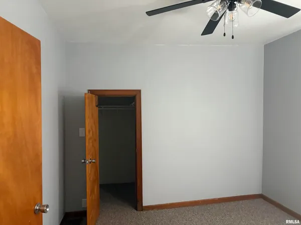 a view of a hallway with closet