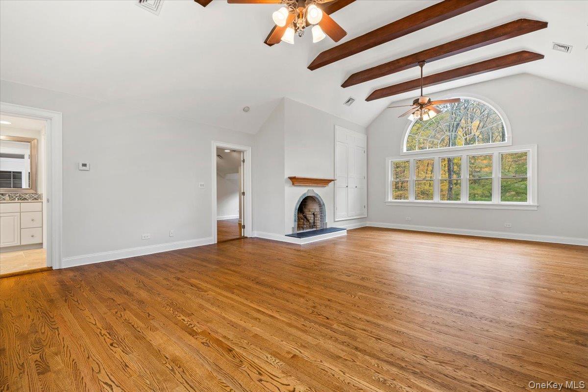 110 Oliver Road Bedford, NY 10506 - Photo 14 of 33 a view of empty room with wooden floor and fan