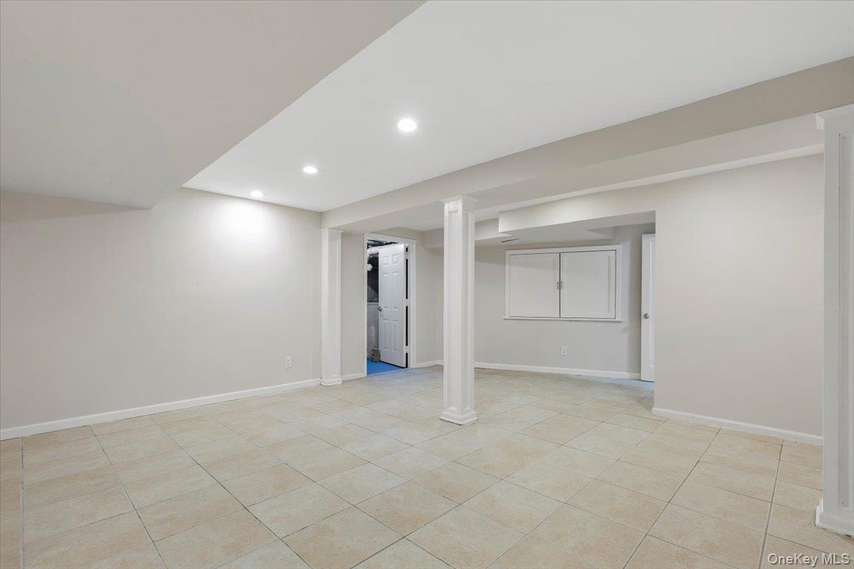 110 Oliver Road Bedford, NY 10506 - Photo 25 of 33 an empty room with closet and a window