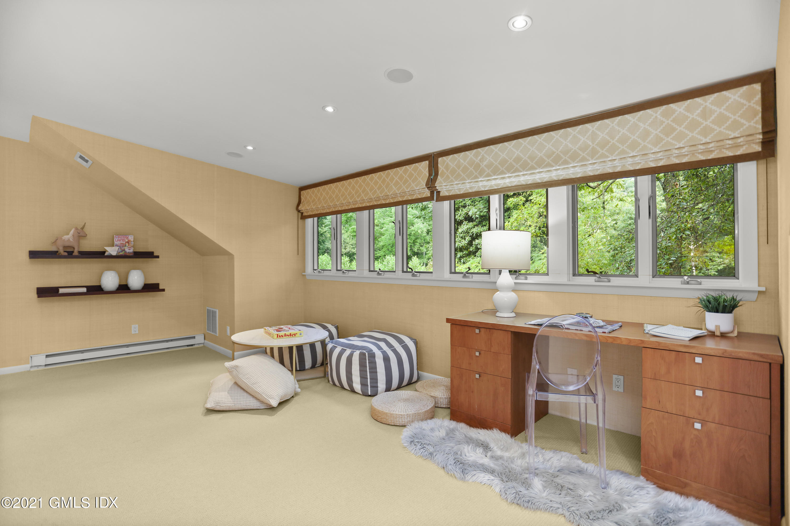 12 Guinea Road Greenwich, CT 06830 - Photo 15 of 29 a living room with a large window and table