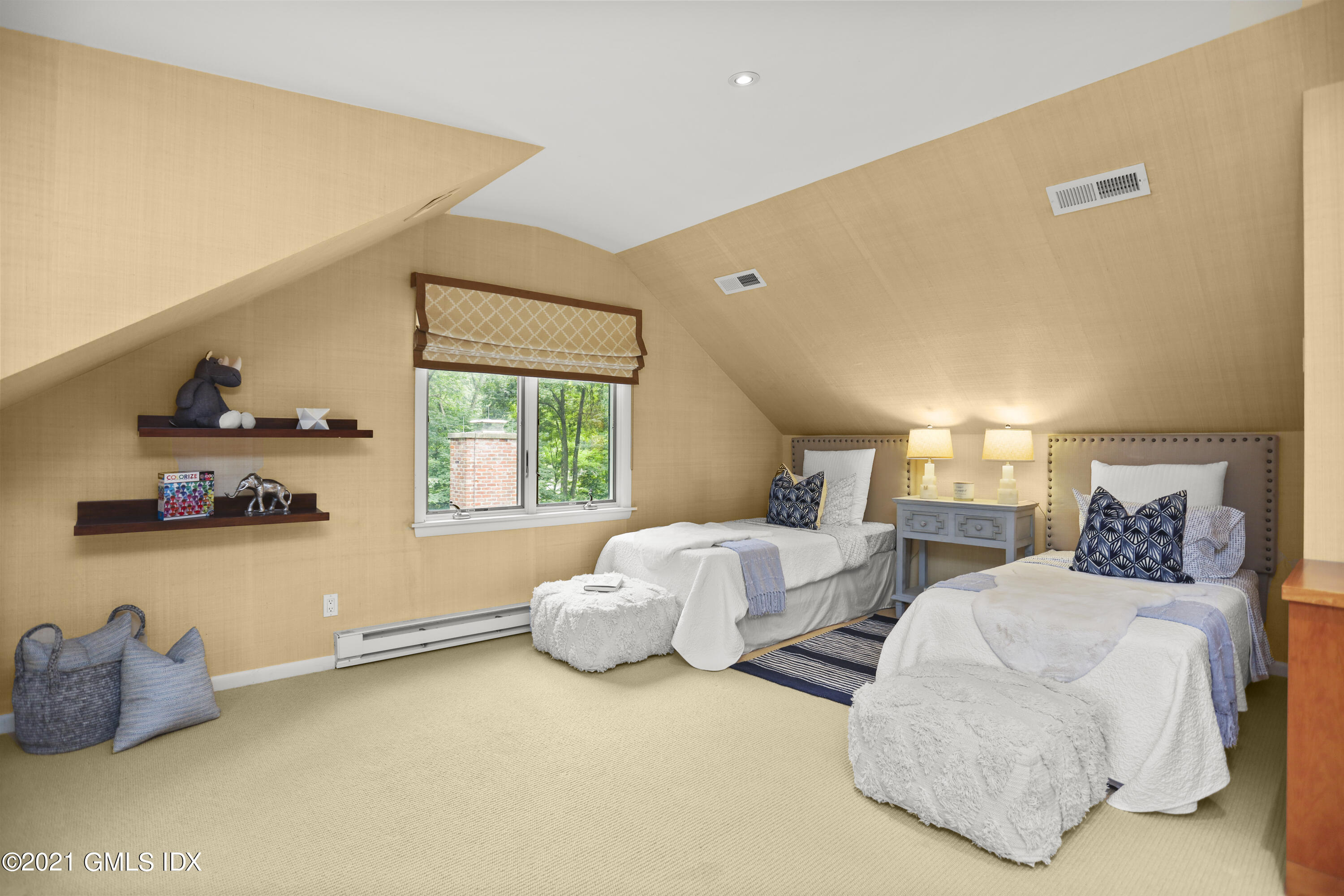 12 Guinea Road Greenwich, CT 06830 - Photo 16 of 29 a bedroom with two bed and a large window