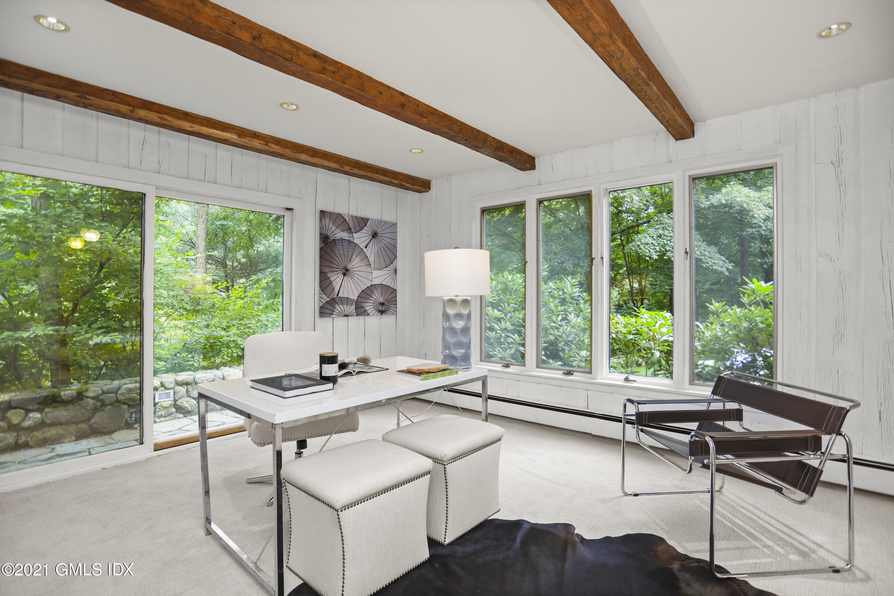 12 Guinea Road Greenwich, CT 06830 - Photo 8 of 29 a living room with furniture and a floor to ceiling window