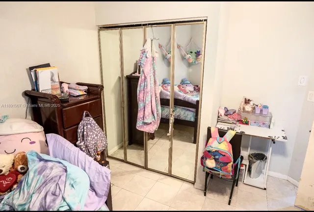 a view of a livingroom with furniture and window