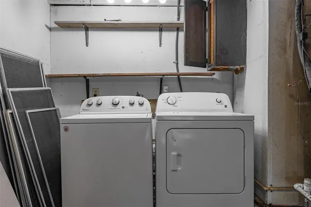 a utility room with dryer and washer