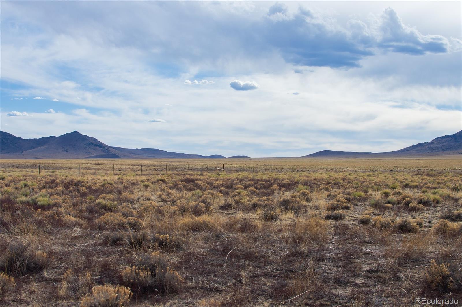 67 Kettledrum Road Sanford, CO 81151 - Photo 14 of 15 a view of city and mountain