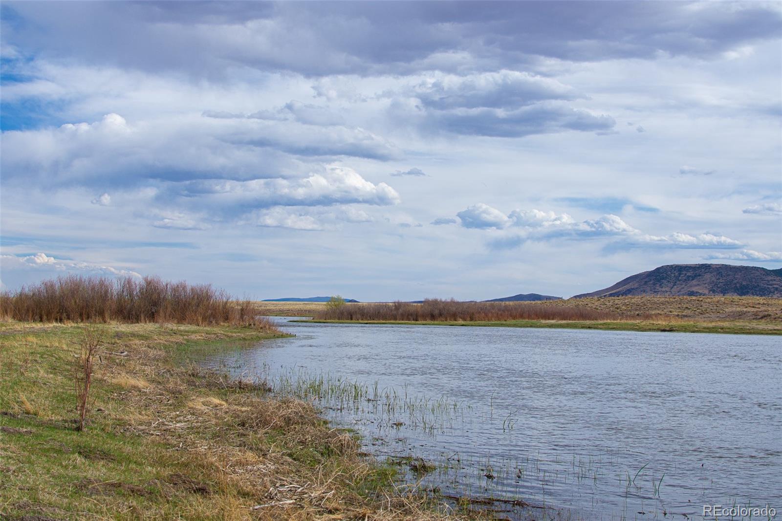 67 Kettledrum Road Sanford, CO 81151 - Photo 5 of 15 a view of lake view and mountain view